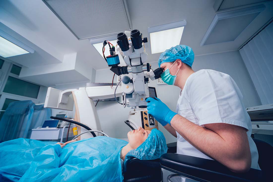 Doctor performing cataract surgery on a patient